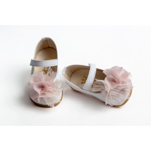 First steps baby girl leather shoes decorated with muselin and glitter tulle
