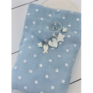 Christening favor for boy pouch with mother of pearl decoratives