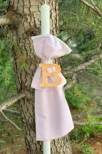 Christening candle for girl with  baby pink striped and white fabric and wooden monogram