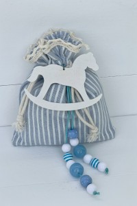 Christeninh favor for boy, pouch with beads and wooden horse