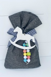 Christening favor for boy, pouch with horse and beads