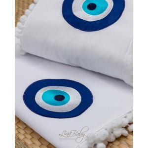 Oilcloth for boy, with embroidered evil eye
