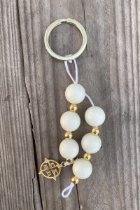 Christening martyrika for boy and girl, keychain made of beads and gold coin with cross