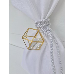 Wedding favor silk pouch with  decorative diamond inside a gold geometric shape