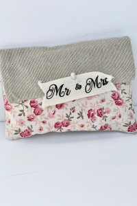 Favour envelope made of fabric combination with flowers