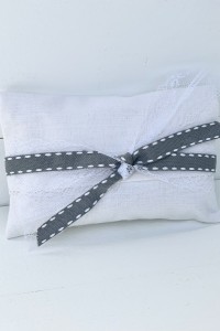 Wedding favor fabric envelope with lace and stitch ribbon