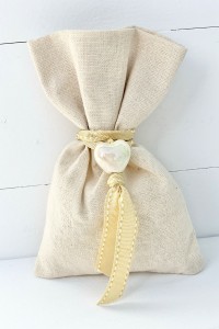 Wedding favor pouch with ceramic heart